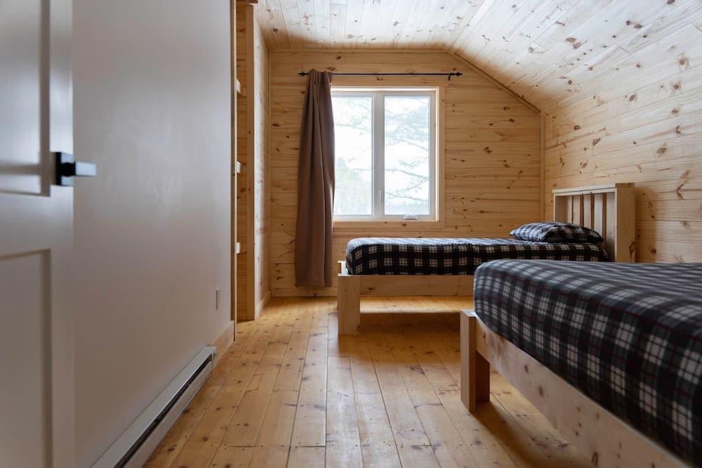 Bowman Ski Chalet | [# 4 The Raven] Chalet on the banks of the river.