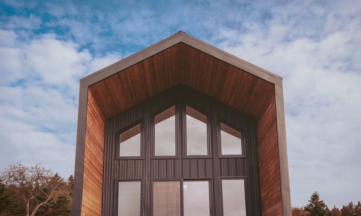 Riverport Cabin | A sanctuary of architectural restraint and unmediated coastal observation.