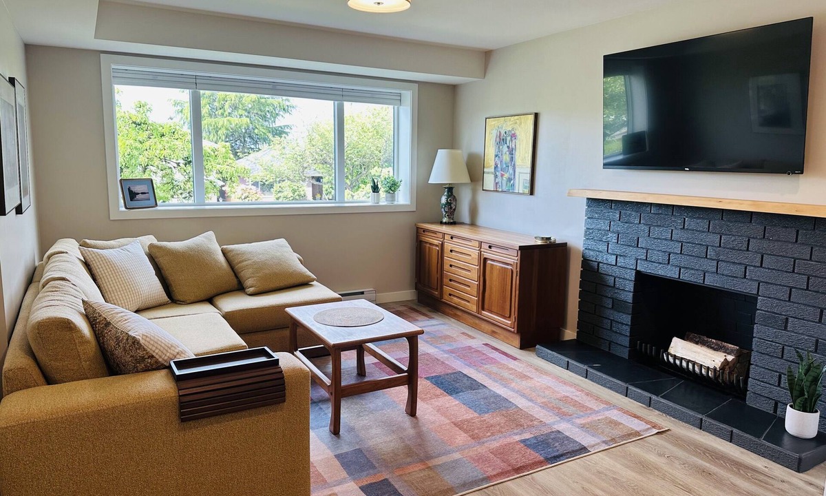 Renfrew-Collingwood Apartment | Central East Van main floor suite with a view