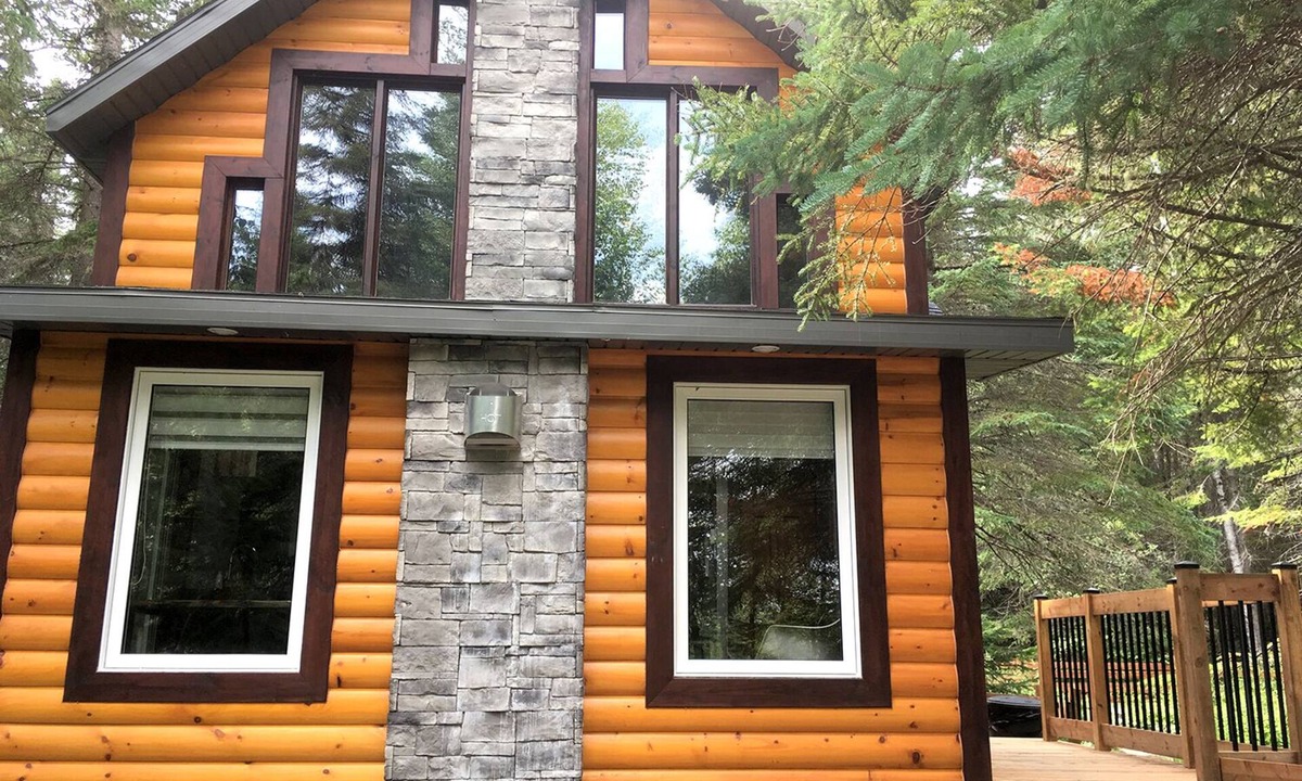 Saint Hilarion Condo | Cottage on the edge of a lake with trail, waterfall and pond