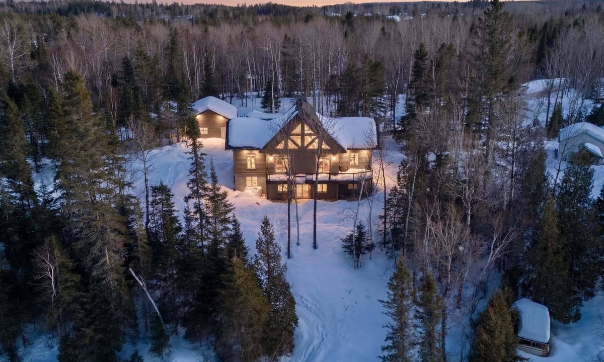 Saint-David-de-Falardeau Ski Chalet | Enjoy our cozy waterfront chalet with a private hot tub, stunning views,