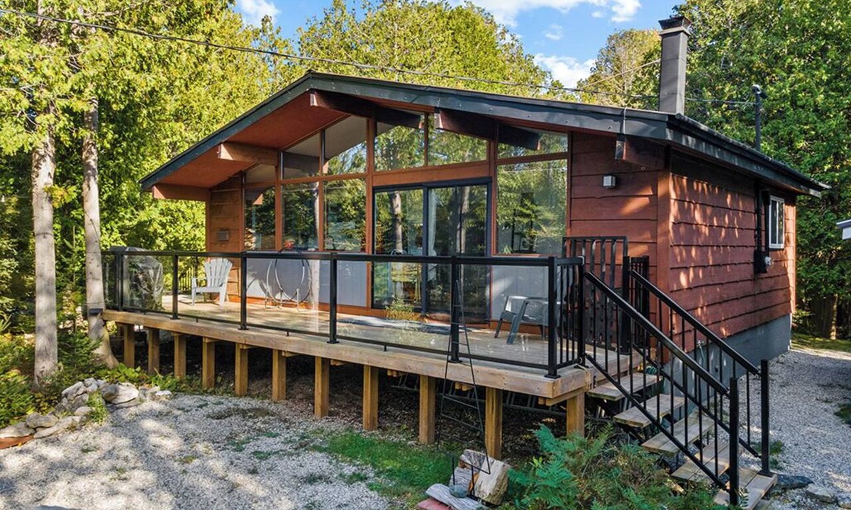 Miller Lake House | Escape to Stone & Timber: A private forest retreat on nearly 4 acres between Tobermory and Lion's Head. Enjoy vaulted ceilings, a cozy wood stove, private walking trails, and easy access to hiking, beaches, boat launches, and Dark Sky stargazing.