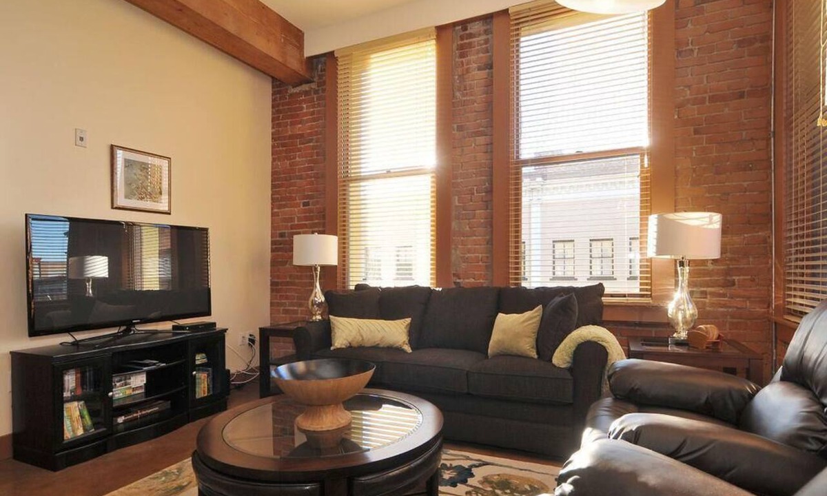 Downtown Victoria Condo | Historic Loft w/Exposed Brick & Timber Beams