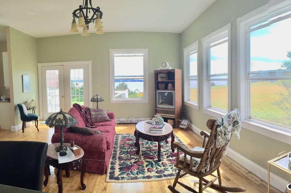 Port Hood Cottage | Island Retreat in Elegantly Restored Schoolhoue with Panoramic Ocean Views