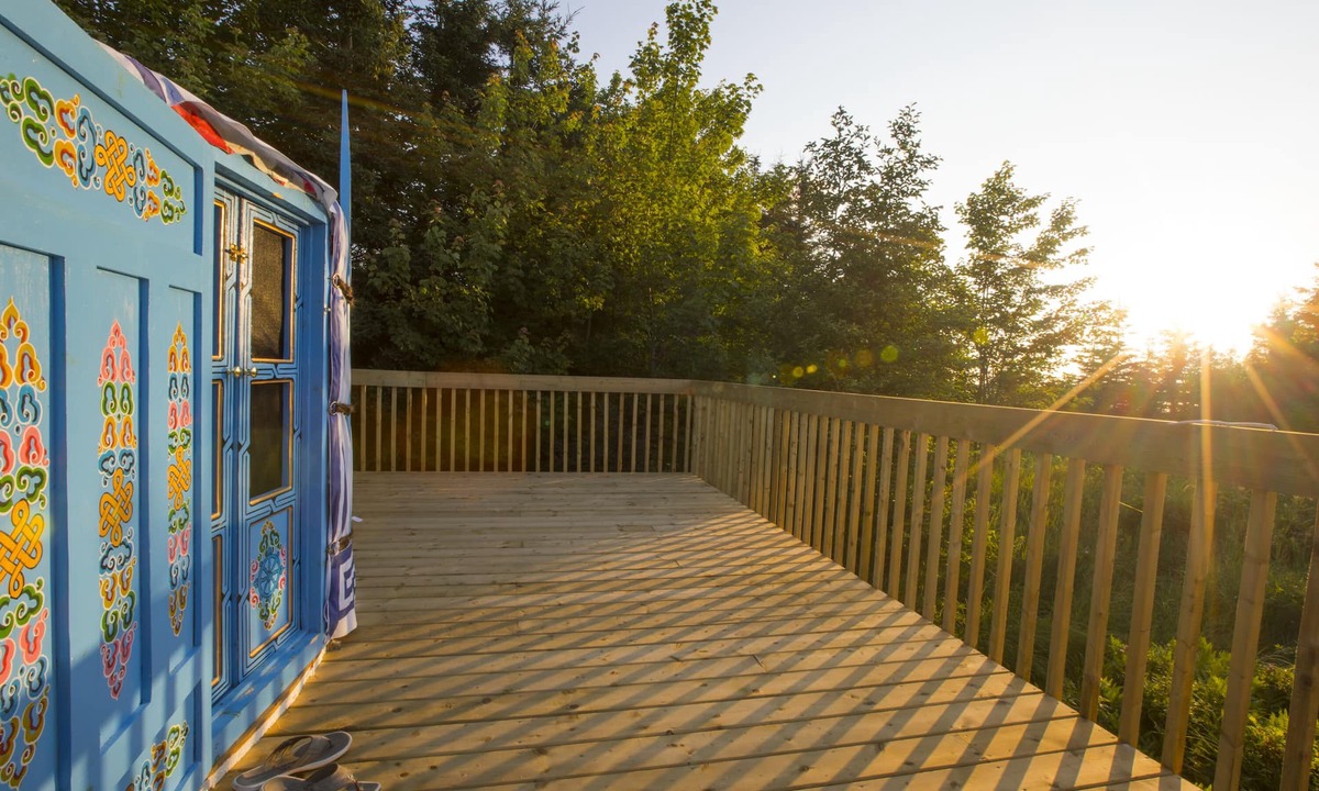 Indian Brook Resort | Large sky blue yurt at Cabot Shores Wilderness Resort