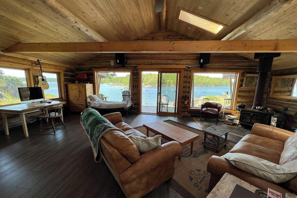 Willisville Cottage | Log Boathouse in McGregor Bay right on the water!