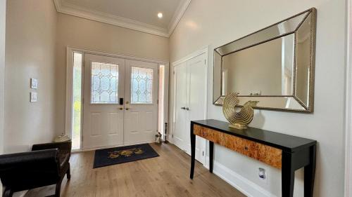 Clarkson-Lorne Park House | Luxury 4BR Retreat with Pool, Piano, Spa & Games