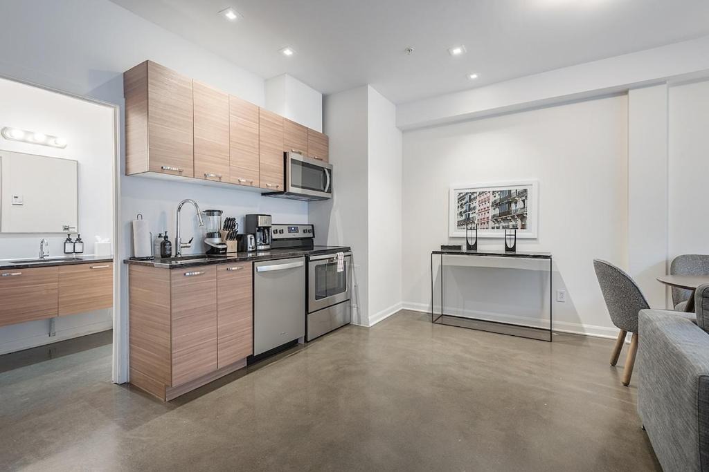 International District Apartment | Luxury Old Montreal Suite with Soaring Ceilings