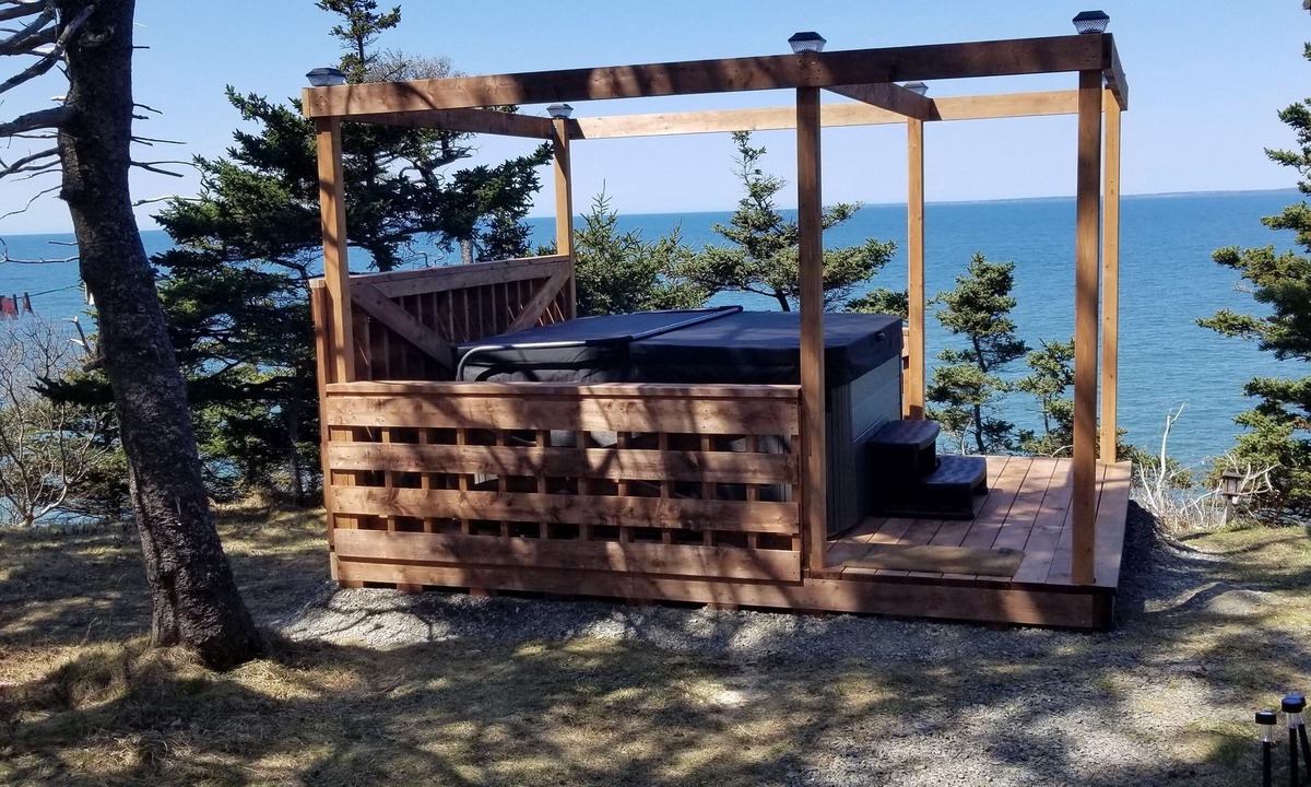 Clare Cottage | Oceanfront mini home, two decks, with spectacular views.