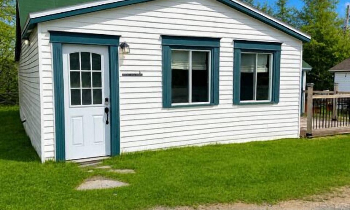 Port Rexton House | Relax at The Bonavista Branch House - Port Rexton, a cozy 2BR retreat near Skerwink Trail and Trailway. Once home to railway engineers and conductors, this updated cottage offers firepit evenings, local dining, Port Rexton Brewing, and Nfld charm.