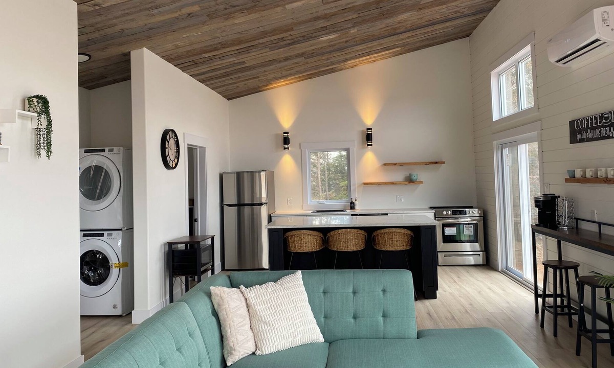 Alberton Cottage | Rivers End Retreat located on cascumpec river. Private hot tub and bunk house.