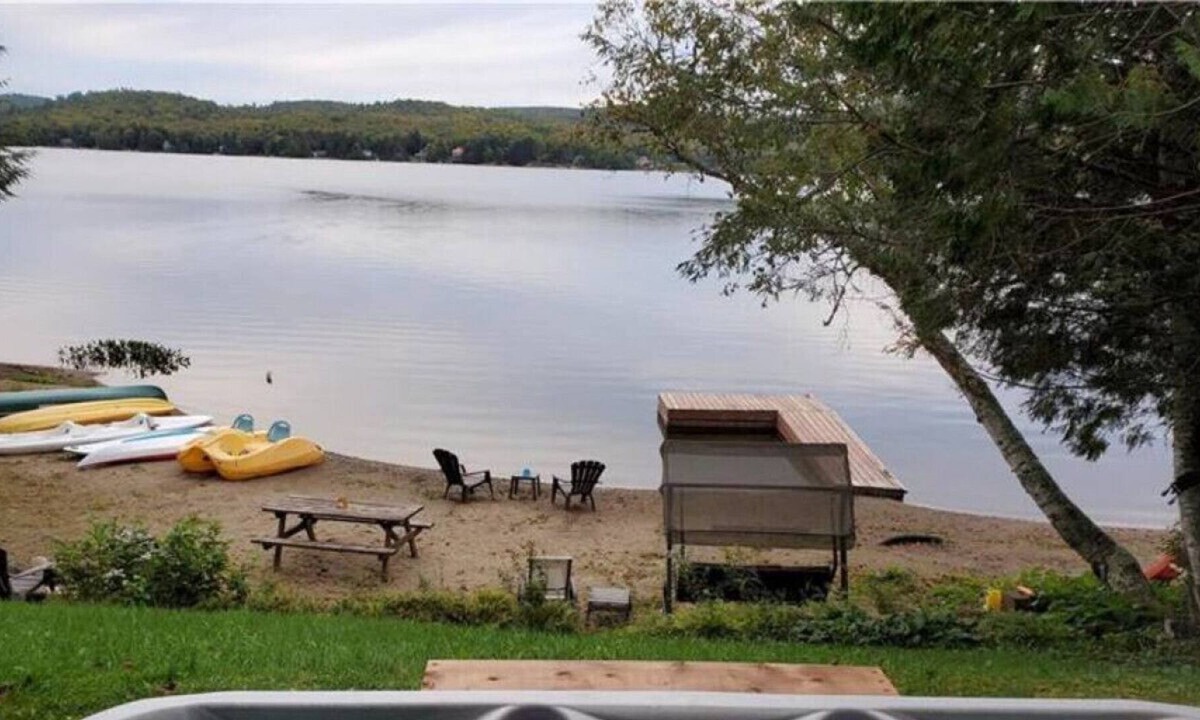 Amherst House | Sandy beach with spa and fire pit