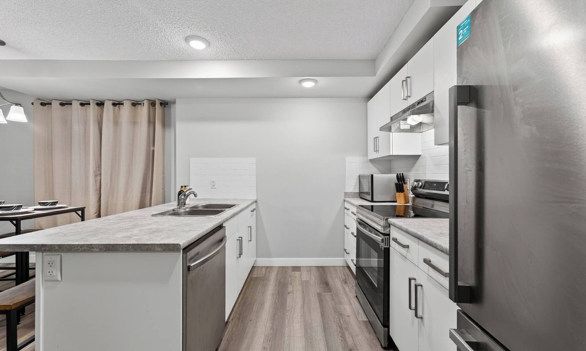 North Central Edmonton House | Spacious 3-Bedroom Home with TVs in Every Room & Game-Night Hockey Table