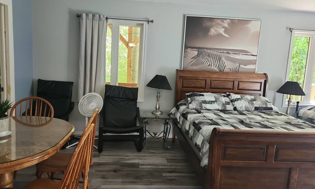 Grand Bend Apartment | Spacious bedroom with an ensuite and separate entrance