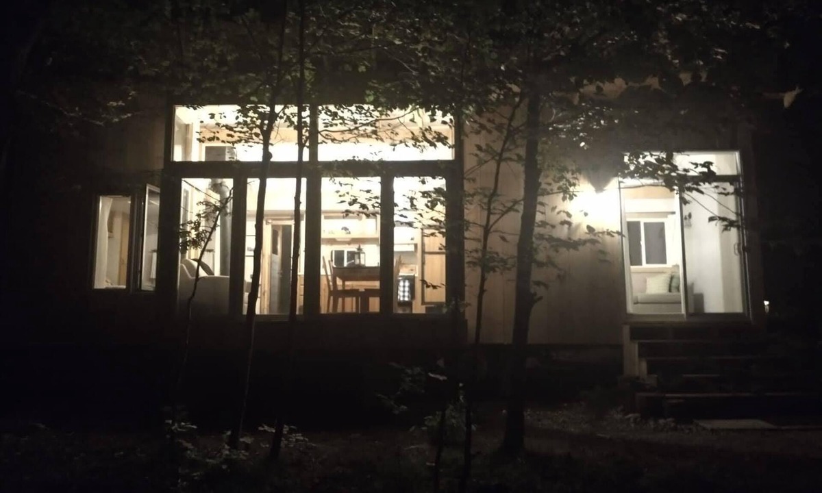 Central Frontenac House | The Coachman- Woodland Tiny Home with Sauna and Trails 15 minutes from Bull Lake