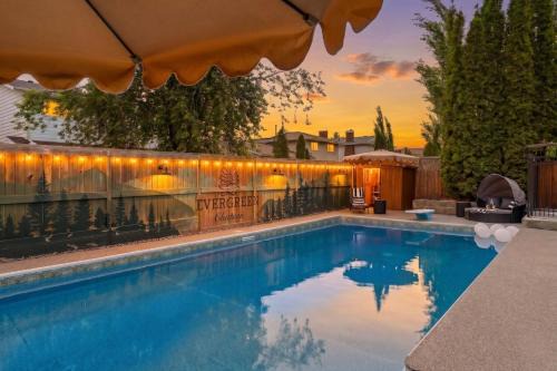 Southwest Edmonton Apartment | The Evergreen Château - Pool & HotTub - Barrel Sauna - Gym
