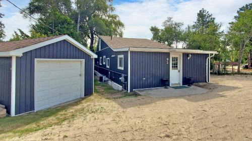 Wasaga Beach House | Wasaga Beach 1 - Walk to Main Beach - Riverfront - Sleeps 10 - 95 Mosley St