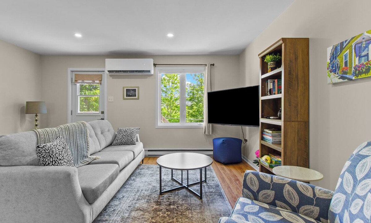 Downtown St. John's House | Welcome to The Crossing, a thoughtfully restored 3-bedroom home on a quiet residential street in historic St. John's. Enjoy free off-street parking, a private fenced yard, and all the comforts of home—just minutes from the best of St. John's.