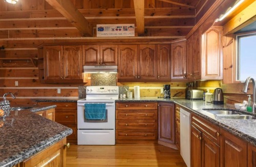 Front of Yonge Cottage | 4-Season Lakefront Cottage With Pool and Hot Tub for large groups!