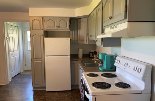 Terra Nova Apartment | A clean, comfortable and pet-friendly St. John's home base just 8 minutes from downtown. This well-equipped 1BR lower-level apt sleeps 3 (2 adults + 1 child), with a full kitchen, laundry and private entrance—ideal for exploring the city and beyond.