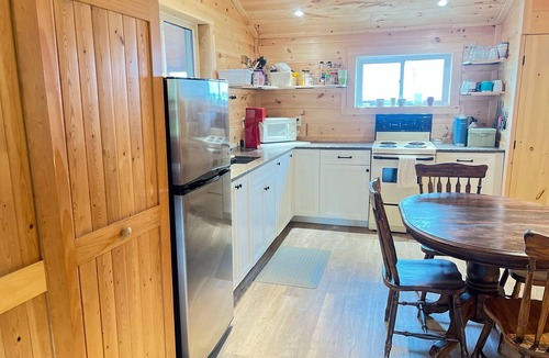 South Glengarry Cottage | A cozy riverfront retreat, Grandfather’s Landing cottage provides it all!