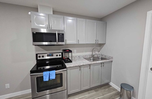 Regina House | A Fully furnished basement suite with separate entrance.