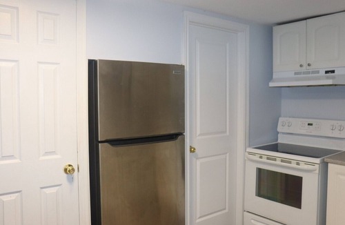 Fredericton Apartment | Abby’s Lodge | Modern 2BR Retreat | Prime Downtown Location