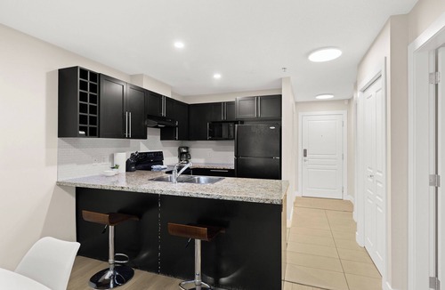 Central Okanagan Condo | Afternoon Okanagan Sunshine - Steps To The Beach