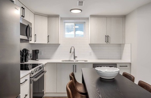 Southeast Calgary House | Alpine Elegance | Modern 2BR Suite