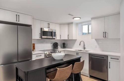 Southeast Calgary House | Alpine Elegance | Modern 2BR Suite