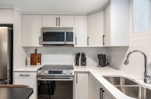 Southeast Calgary House | Alpine Elegance | Modern 2BR Suite