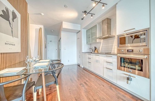 Toronto Entertainment District Apartment | Bright 2BR Toronto Retreat by Union Station
