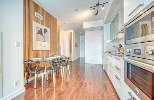 Toronto Entertainment District Apartment | Bright 2BR Toronto Retreat by Union Station