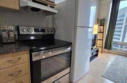 Downtown Edmonton Apartment | Cam - Downtown Loft | Skyline Views near Rogers
