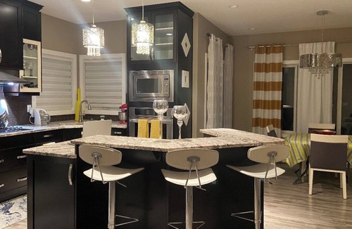Chestermere House | "Charming 2-Bedroom, 2-Bathroom Sanctuary: Your Upstairs Retreat Awaits!"