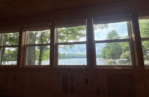 Lyman Cottage | Charming Bunganut Lake Cottage with Private Dock, Sandy Swimming & Kayaks