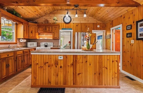 Sebago House | Charming cottage w/access to Sebago Lake, private boat mooring, & cozy sunroom