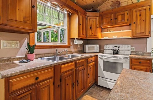 Sebago House | Charming cottage w/access to Sebago Lake, private boat mooring, & cozy sunroom