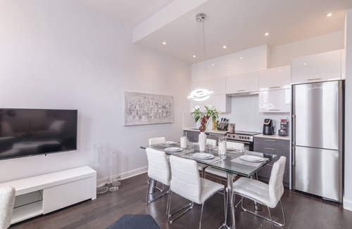 Mile End Condo | Chic Condo with Private Balcony & Hot Tub