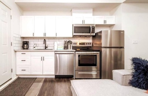 Jasper Place Apartment | Chic Suite - Long Stays - King Bed - Fireplace & WiFi