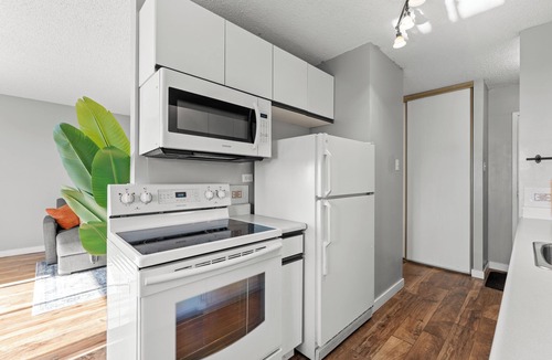Griesbach Apartment | City View Getaway | 2BR Pool Gym Parking