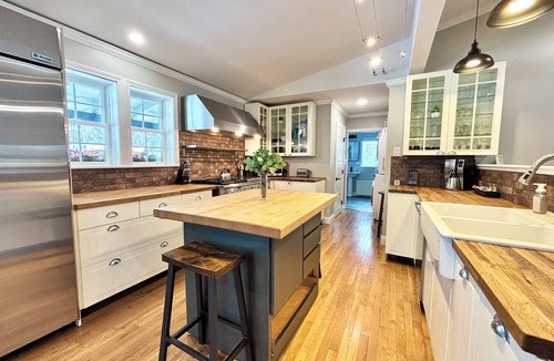 Fort Kent Mills House | Comfort Elevated Hot Tub King Suite Direct Trail Access In Town WiFi