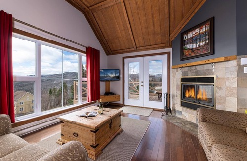 Petite-Riviere-Saint-Francois Condo | Condo 120H: Riverfront Views, Terrace & BBQ