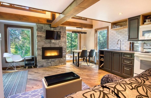 Saint Hilarion Condo | Cottage on the edge of a lake with trail, waterfall and pond