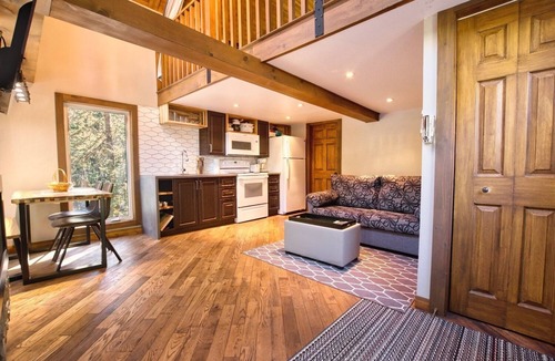 Saint Hilarion Condo | Cottage on the edge of a lake with trail, waterfall and pond