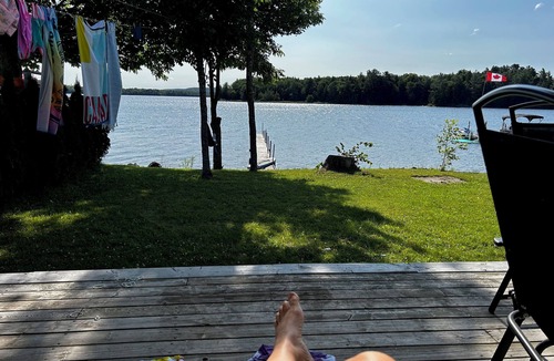 York County Cottage | Covered Porch Cottage on First Eel River Lake