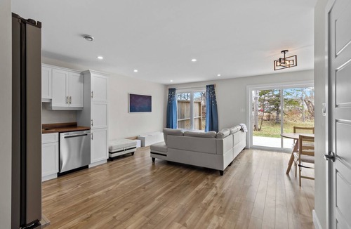 Conception Bay South House | Cozy 3-bedroom coastal home in Conception Bay South, perfect for up to 6 guests. Enjoy 3 queen beds, 2.5 bathrooms, BBQ, and 2-car parking. Close to local amenities, scenic spots, and a short drive to St. John's.