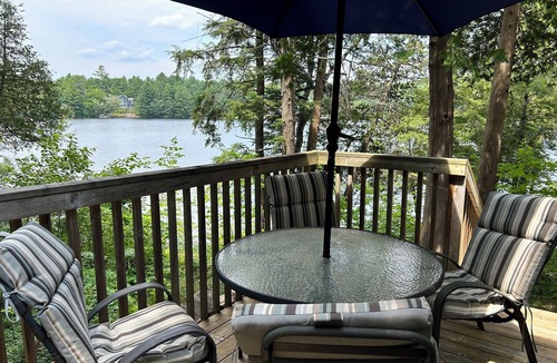 Minden Hills Cottage | Cozy Cove on Gull Lake Getaway to your own cove with swim up dock and sand beach