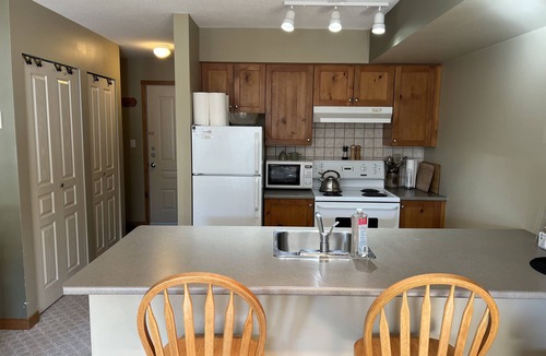 Silver Star Mountain Condo | Cozy Creekside condo on the trails with views - pet friendly too!
