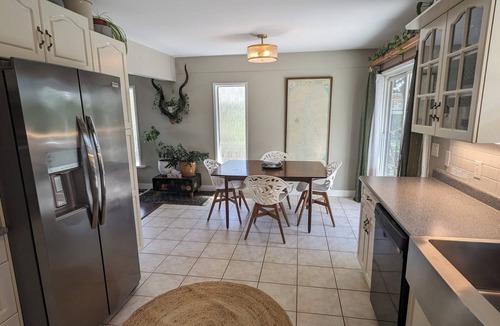 Colwood House | Cozy main floor suite with a breathtaking view.